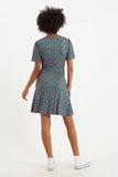 Louche London FRANKIE Ditsy Print Short Dress. Step into the new season in this Louche London FRANKIE Ditsy Print Short Dress. We are so pleased to introduce Frankie, our easy fitting jersey dress featuring a wrap bodice, hip skimming skirt and those important side seam pockets. In a unique ditsy spring bloom print.