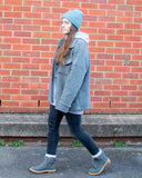 A cosy cross between a shirt and a jacket, wear this Lottie&Moll VAL Ladies Grey Wool Mix Shacket to keep you warm on the coldest of days. With a button front, two big flap front pockets and a curved hemline, shop the shacket look in this cotton and wool mix outer layer. A warm winter must-have!