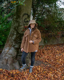 A cosy cross between a shirt and a jacket, wear this Lottie&Moll VEDA Ladies Camel Fun Fur Shacket to keep you warm on the coldest of days. With a button front, two big flap front pockets and a curved hemline, shop the shacket look in this furry cotton and wool mix outer layer. A warm winter must-have!