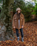 A cosy cross between a shirt and a jacket, wear this Lottie&Moll VEDA Ladies Camel Fun Fur Shacket to keep you warm on the coldest of days. With a button front, two big flap front pockets and a curved hemline, shop the shacket look in this furry cotton and wool mix outer layer. A warm winter must-have!